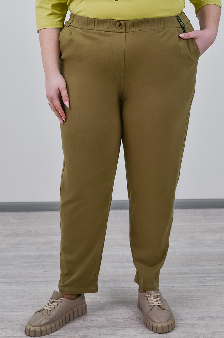 Завужені джинси з еластичним поясом і декоративним ґудзиком великих розмірів