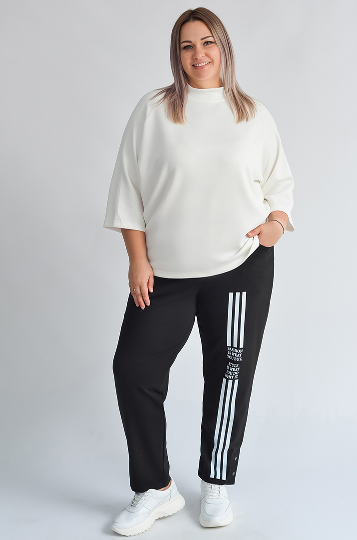 Завужені чорні брюки з білими акцентами великих розмірів
