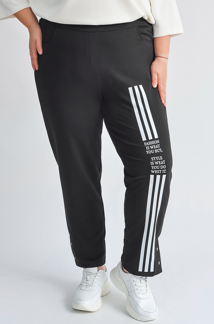 Завужені чорні брюки з білими акцентами великих розмірів