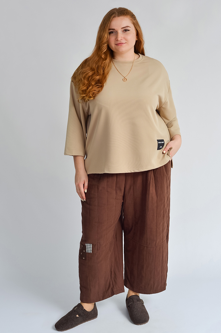 Вільні брюки-банани з декоративною вставкою великих розмірів