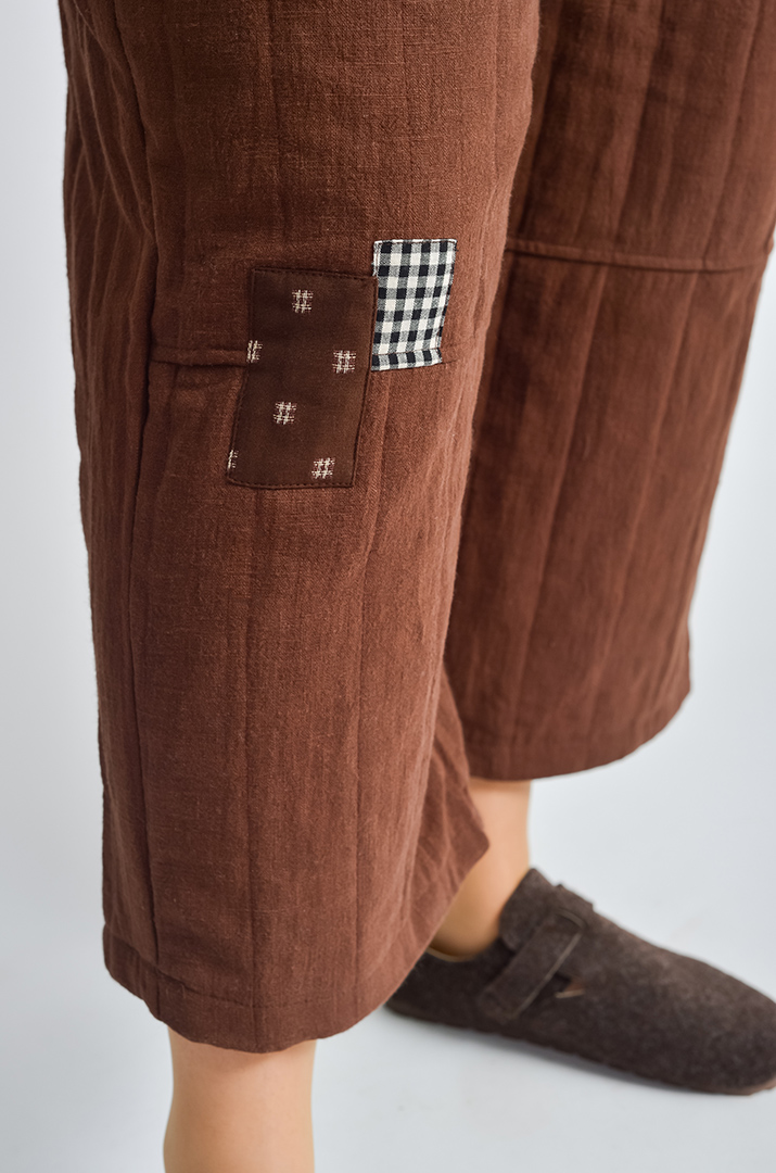 Вільні брюки-банани з декоративною вставкою великих розмірів