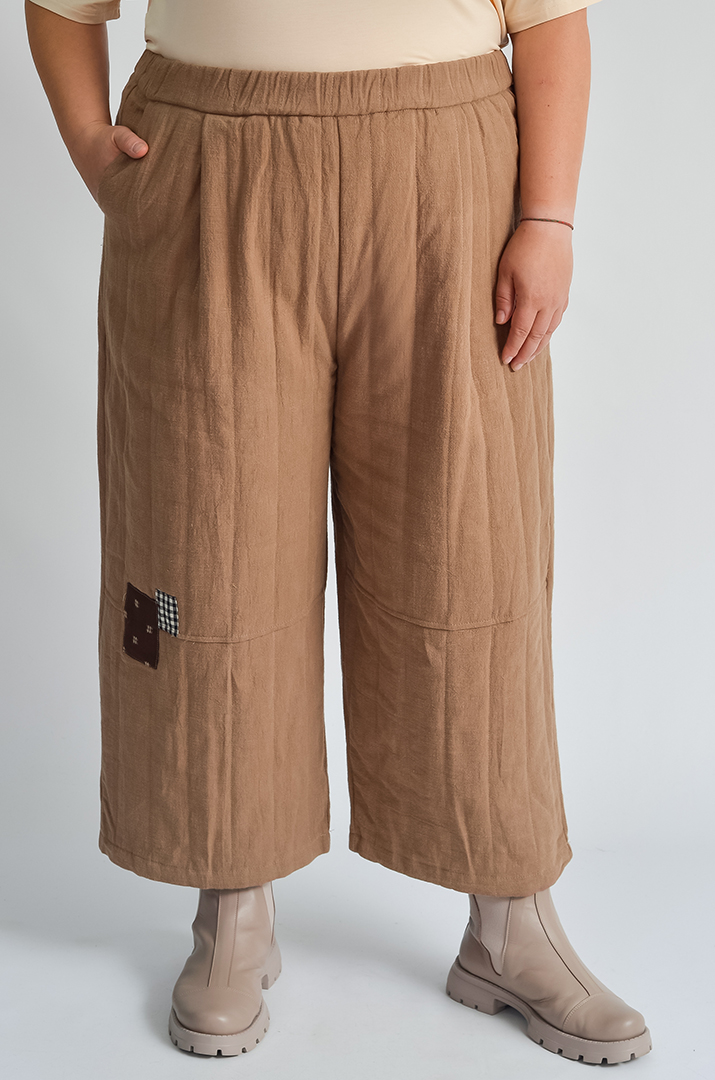 Вільні брюки-банани з декоративною вставкою великих розмірів