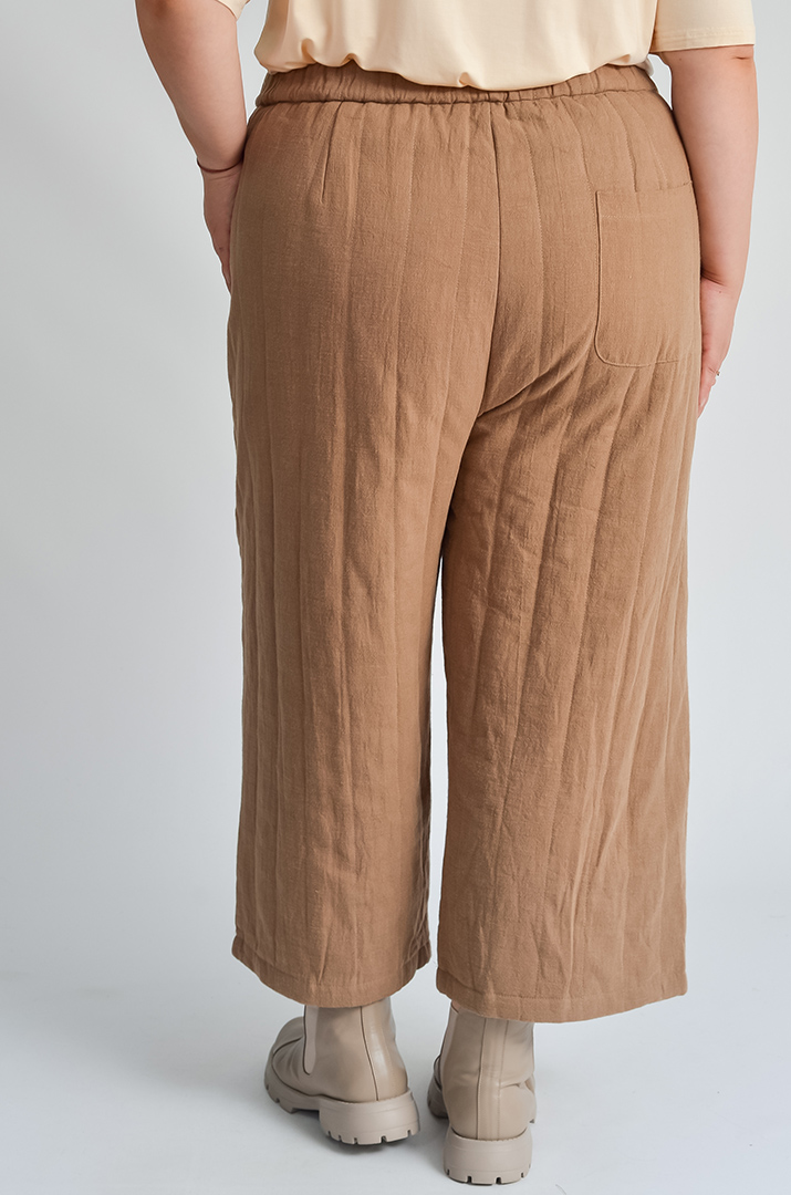 Вільні брюки-банани з декоративною вставкою великих розмірів