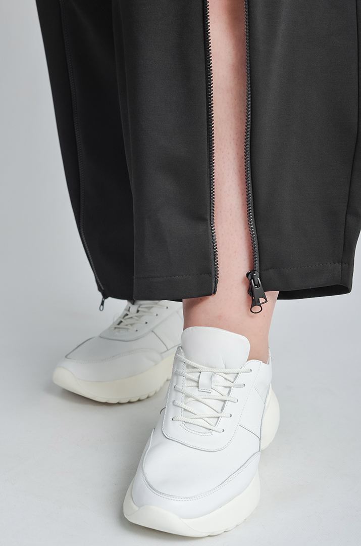 Широкі чорні брюки з блискавками великих розмірів