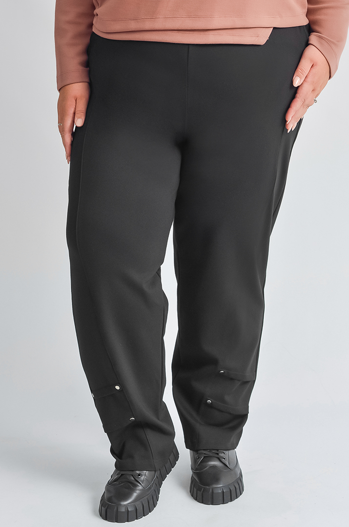 Завужені брюки з декоративними складками великих розмірів