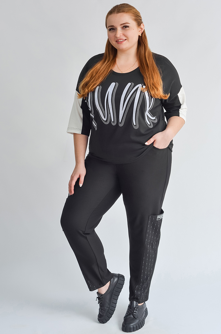 Чорні завужені брюки з боковою декоративною кишенею великих розмірів