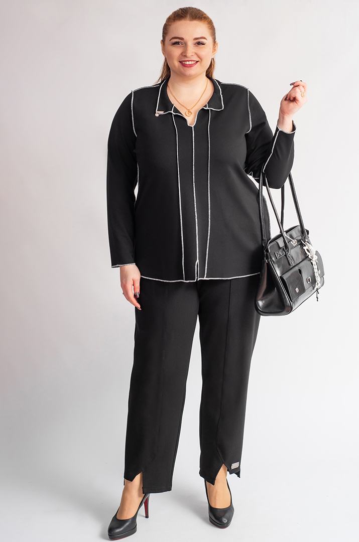 Брюки завужені в чорному кольорі з декоративними розрізами великих розмірів