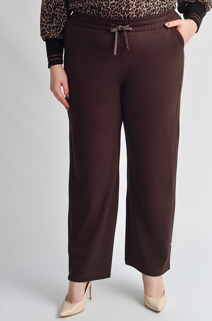 Брюки 7/8 з блискучим шнурком та з кишенями великих розмірів