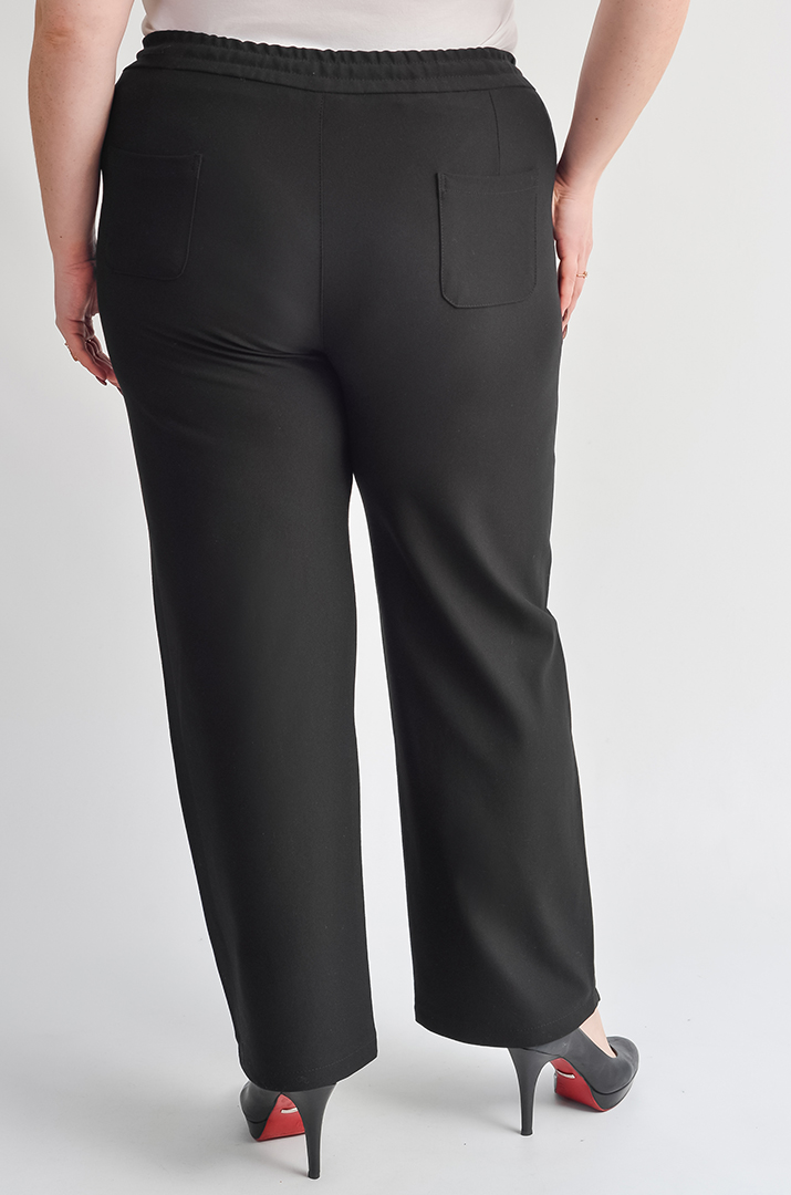 Брюки 7/8 з блискучим шнурком та з кишенями великих розмірів