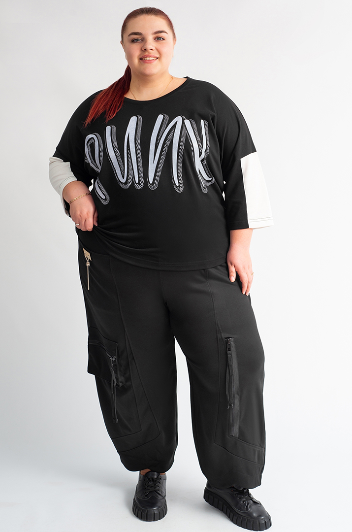 Брюки банани з кишенями та декоративними блискавками великих розмірів