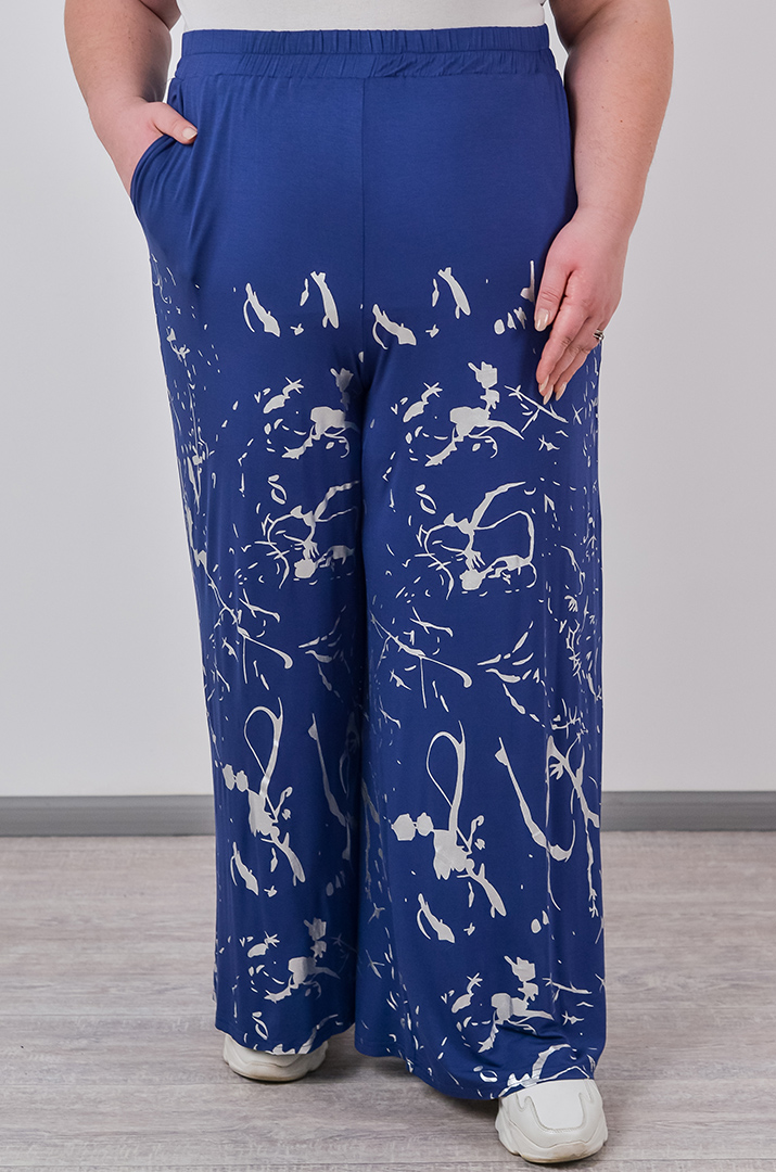 Брюки палаццо зі сріблястим абстрактним принтом великих розмірів