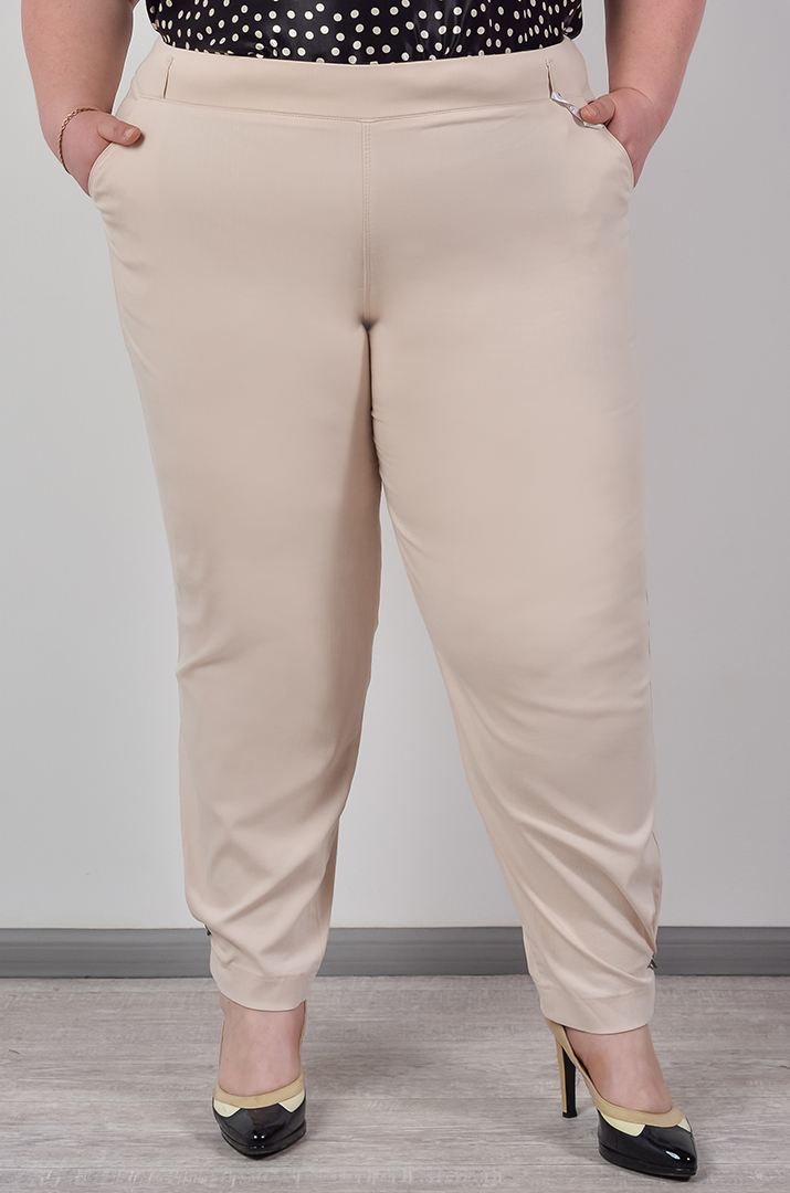 Брюки банани з декоративними кільцями на манжетах великих розмірів