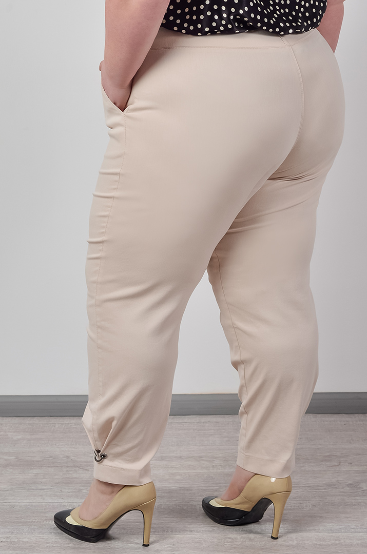 Брюки банани з декоративними кільцями на манжетах великих розмірів