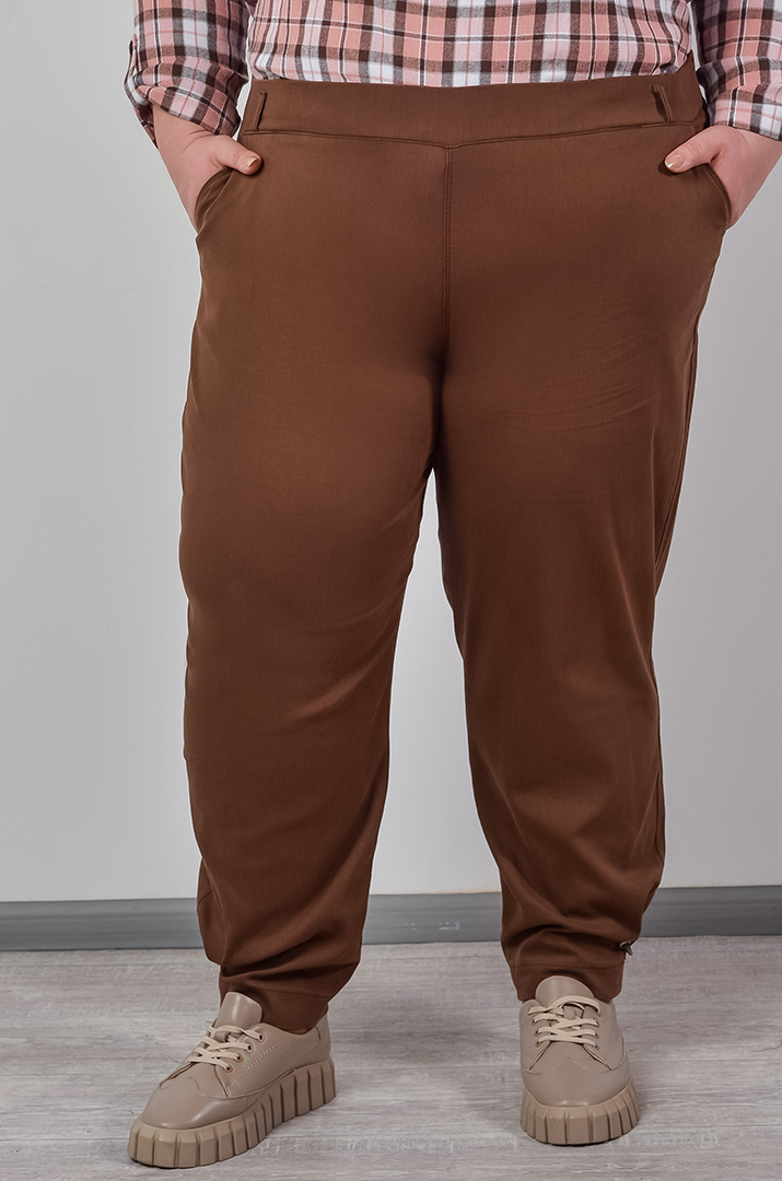 Брюки банани з декоративними кільцями на манжетах великих розмірів