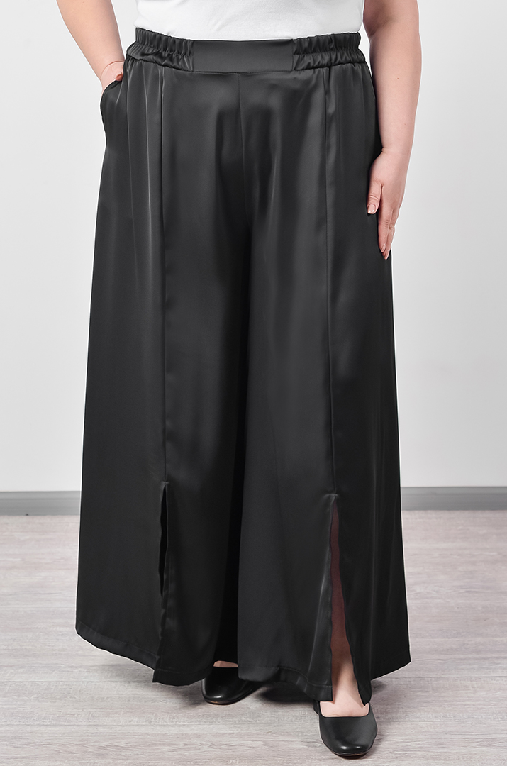 Атласні брюки палаццо з декоративними розрізами великих розмірів