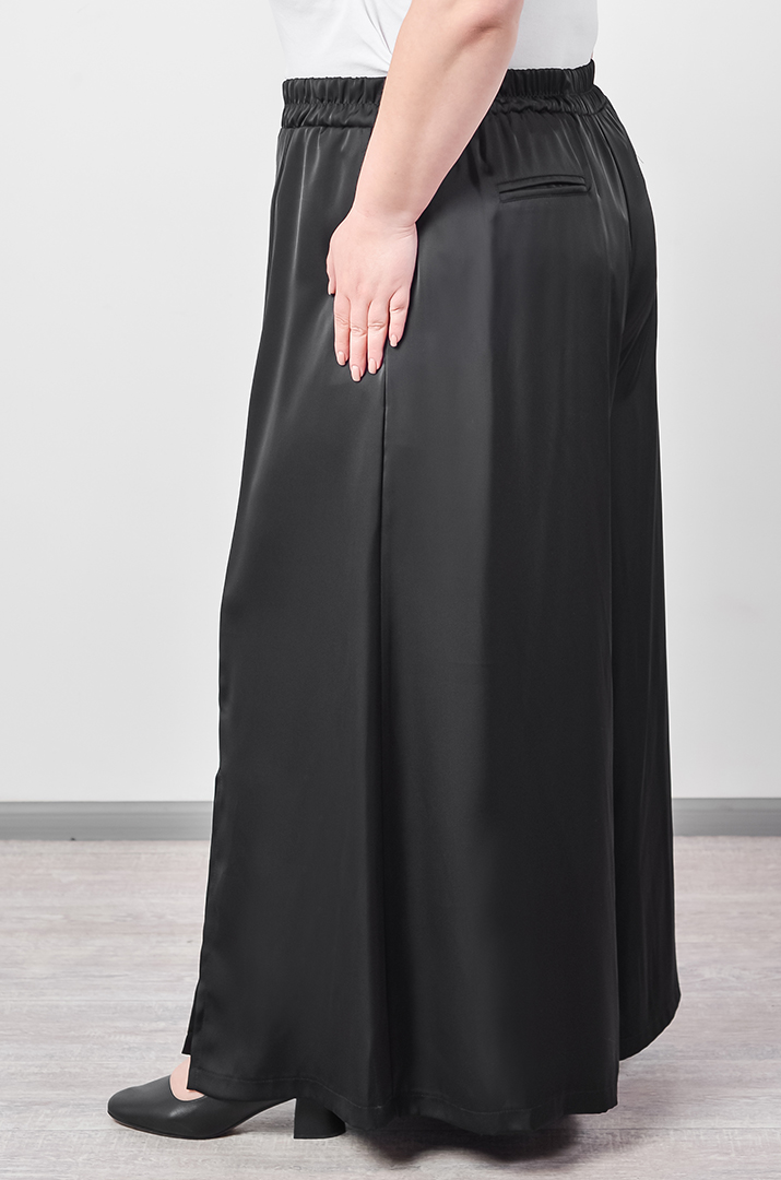 Атласні брюки палаццо з декоративними розрізами великих розмірів