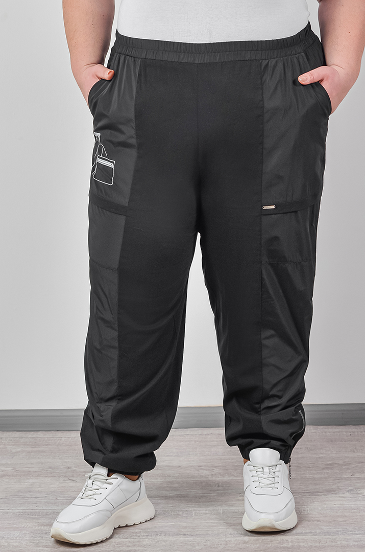 Брюки банани з декоративними блискавками великих розмірів