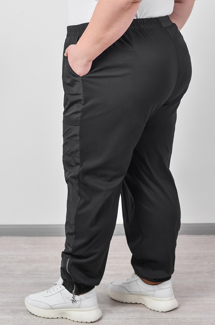 Брюки банани з декоративними блискавками великих розмірів