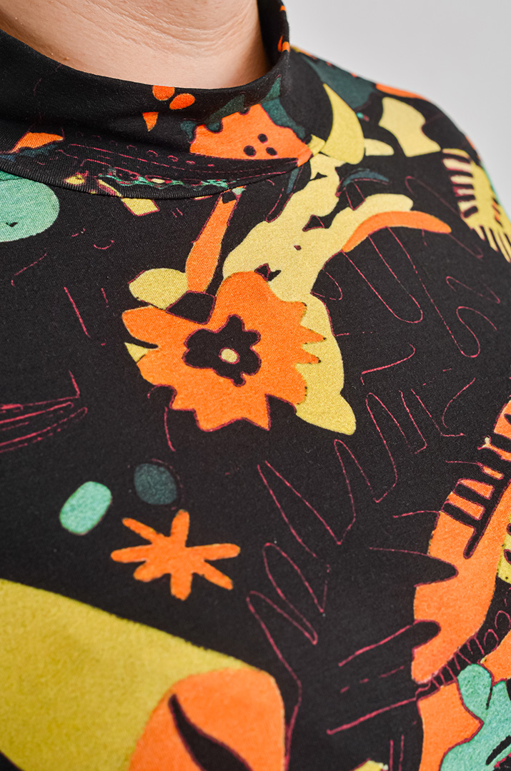 Гольф з графічним флористичним принтом великих розмірів