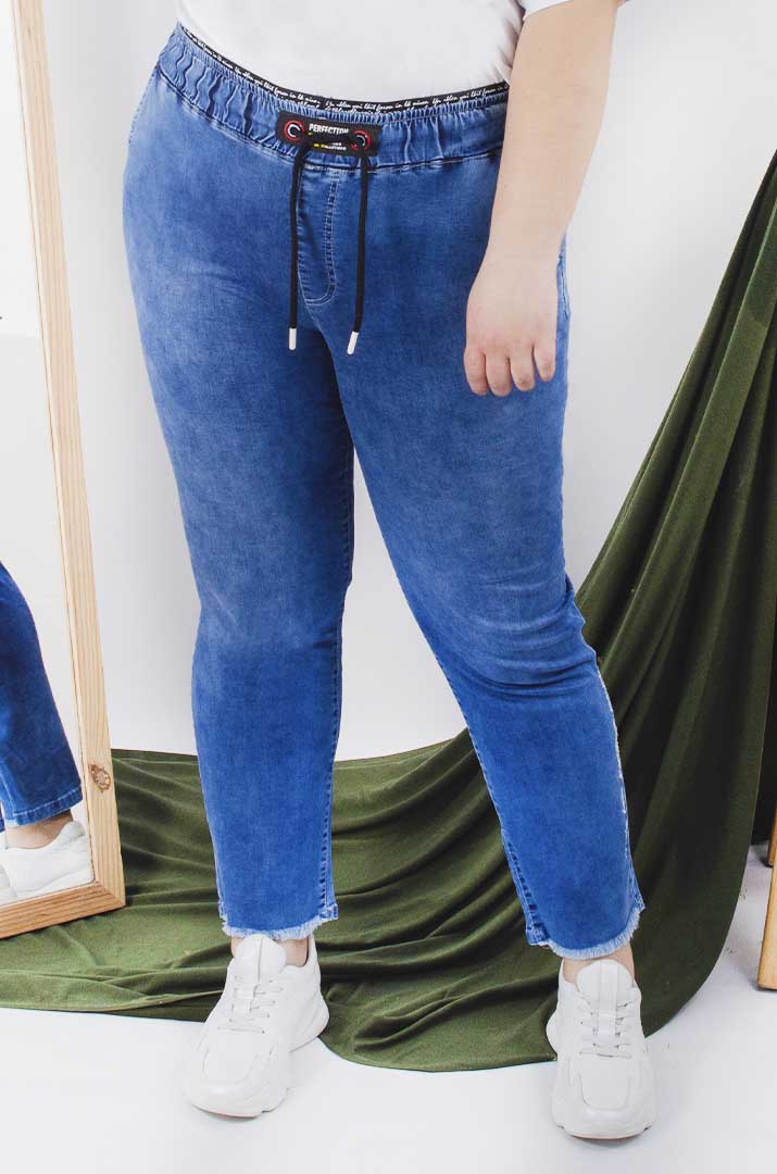 Джинси банани на шнурівці з потертостями батал