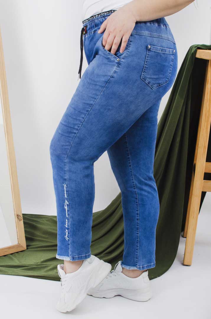 Джинси банани на шнурівці з потертостями батал