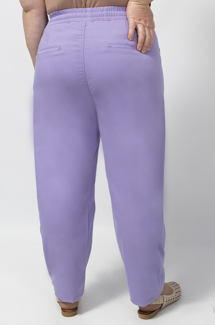 Джинсы бананы сиреневого цвета батал