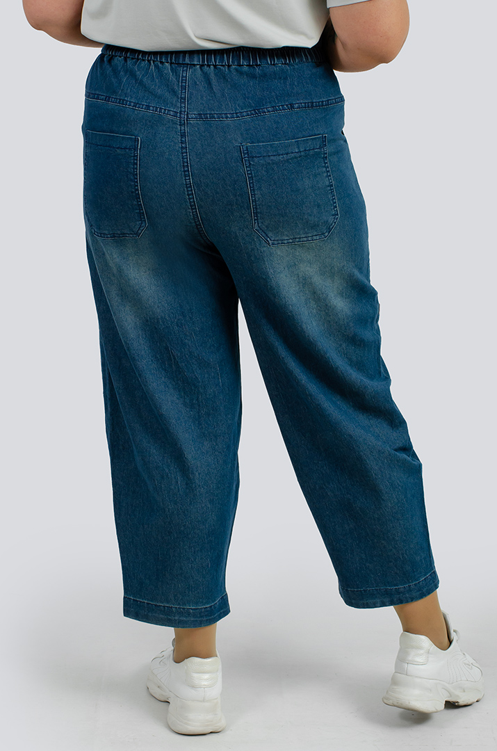 Джинси банани з декоративними кишенями великих розмірів