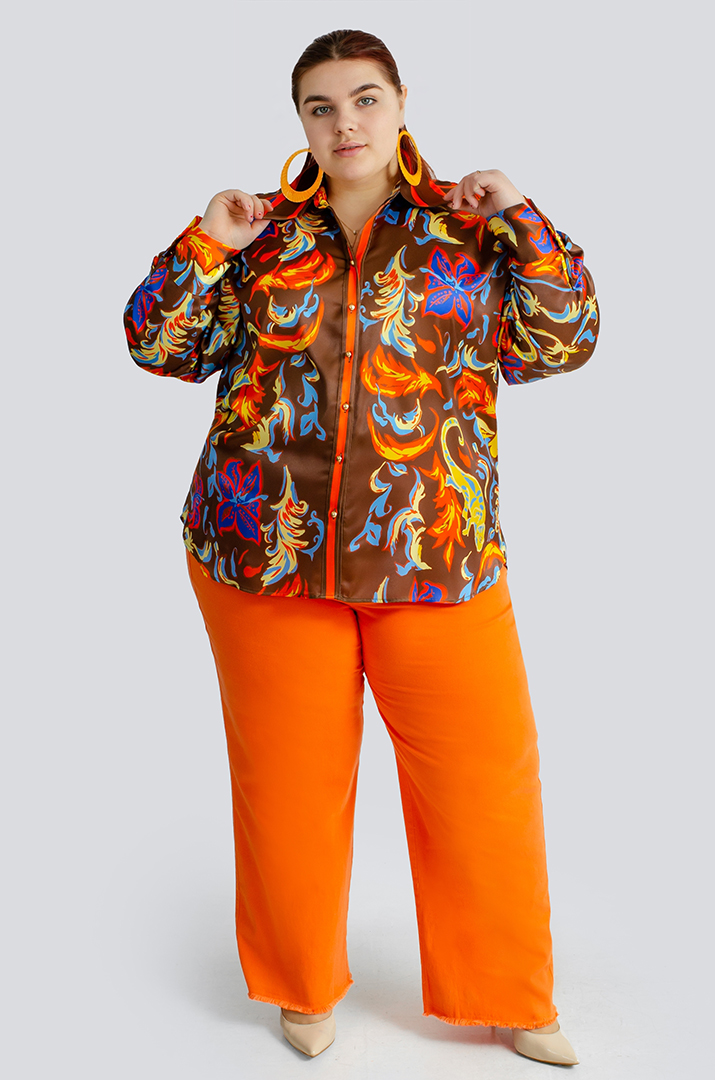 Яркие джинсы с тороками больших размеров