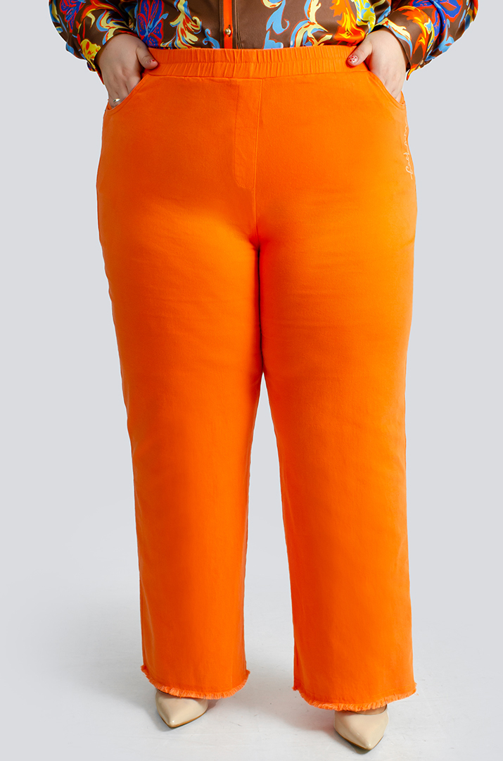 Яркие джинсы с тороками больших размеров