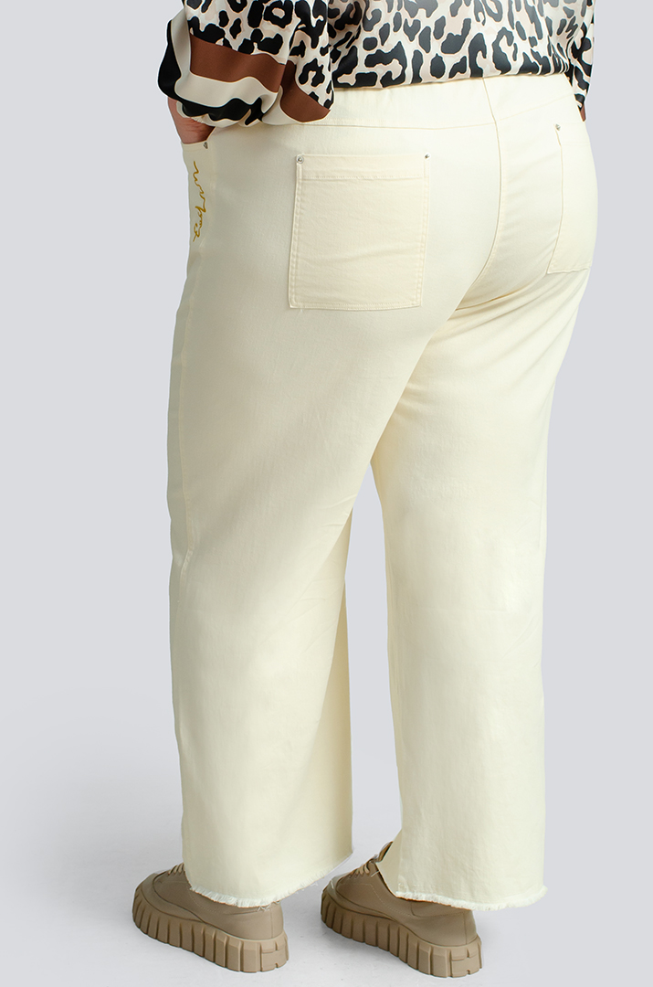 Яркие джинсы с тороками больших размеров