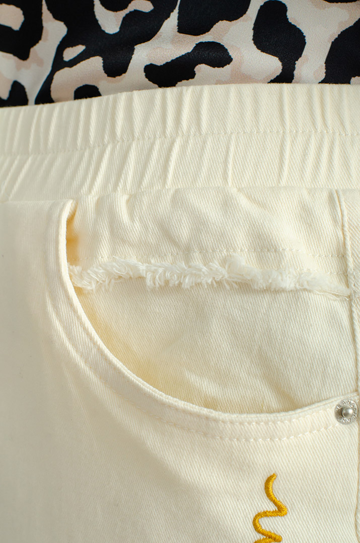 Яркие джинсы с тороками больших размеров