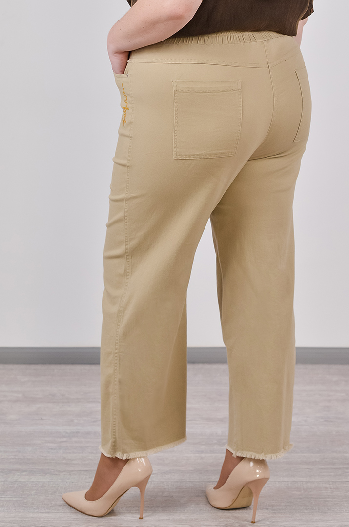 Яркие джинсы с тороками больших размеров