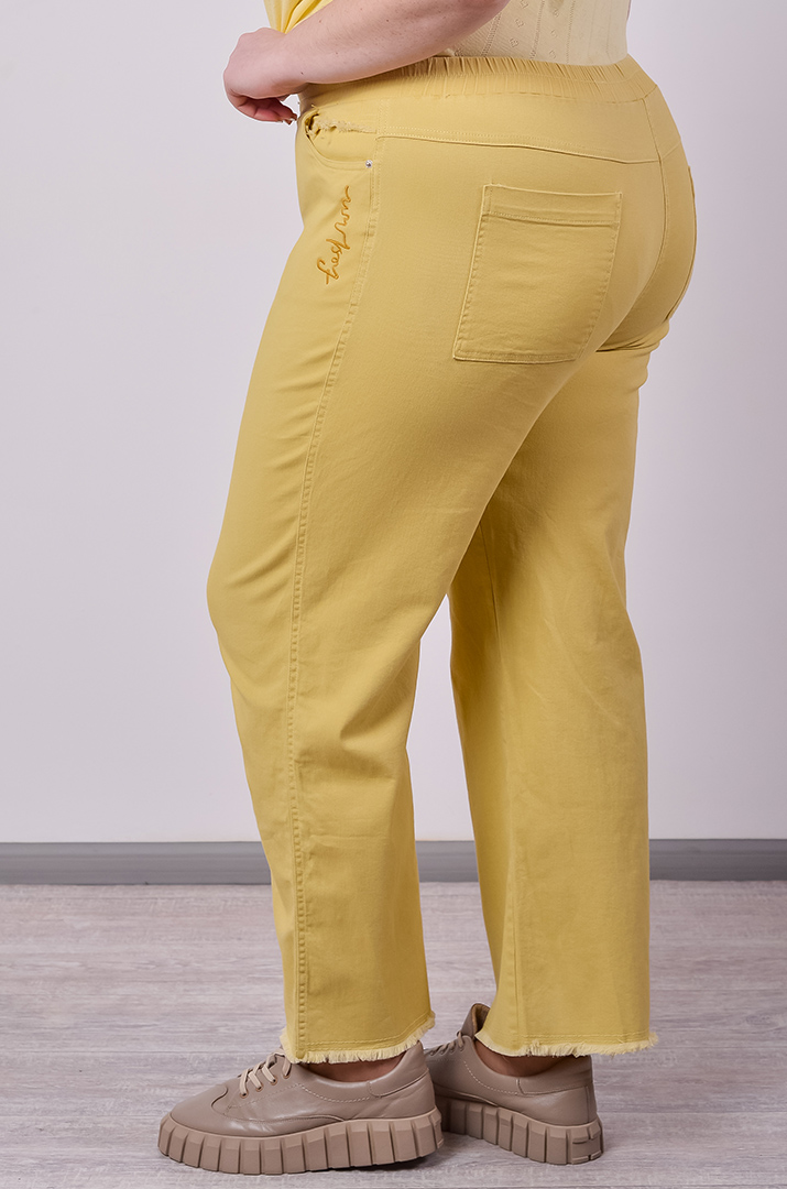 Яркие джинсы с тороками больших размеров