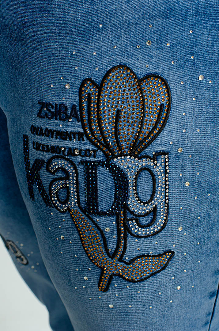 Джинси завужені з декором зі стразів великих розмірів