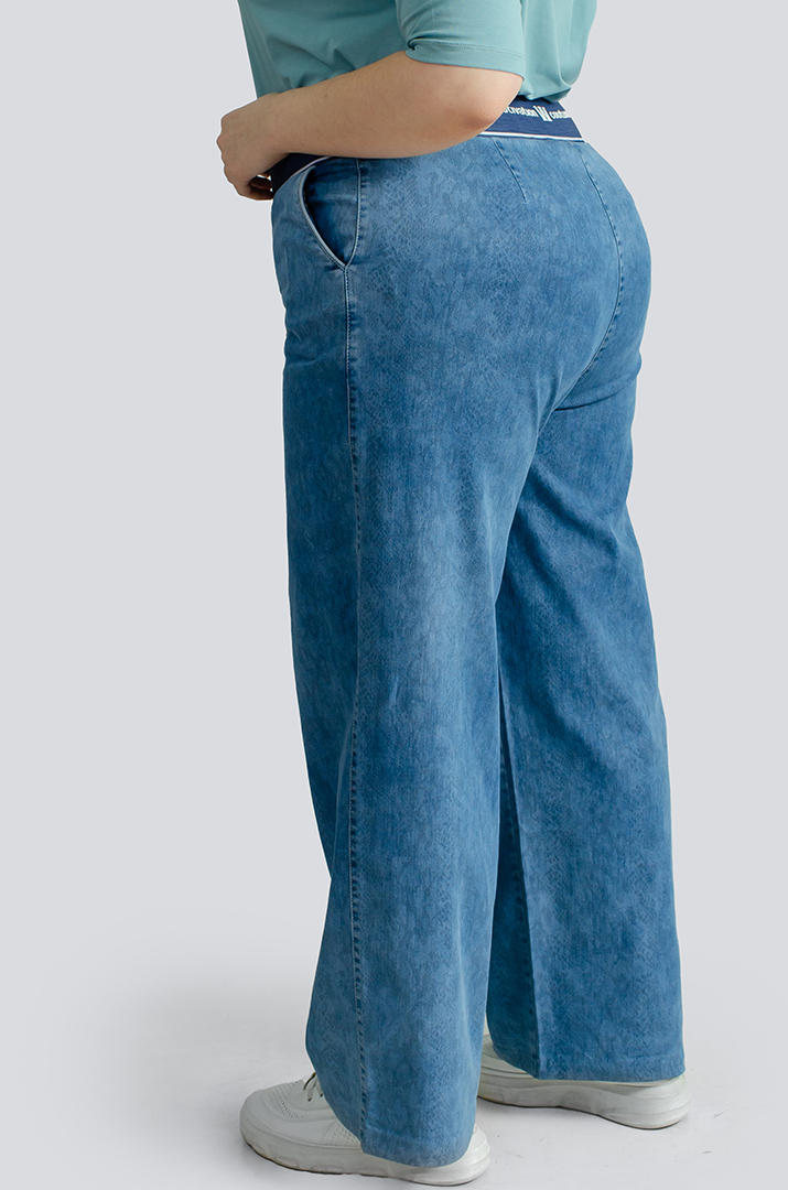 Джинси в принт рептилія великих розмірів