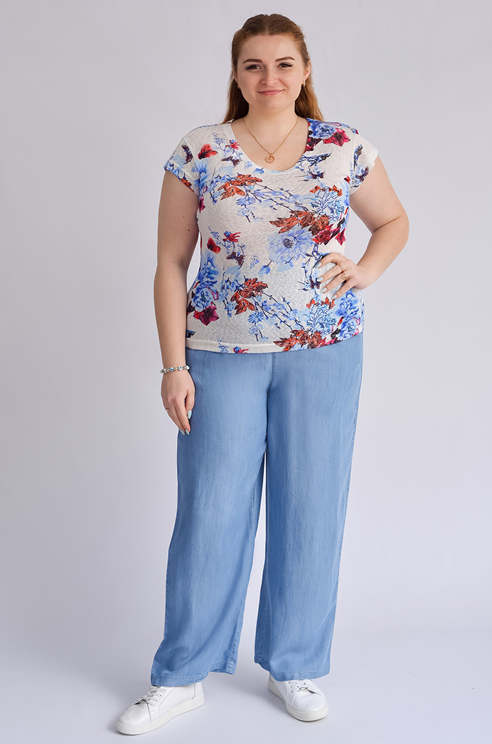 Легкі блакитні джинси з тенселу великих розмірів