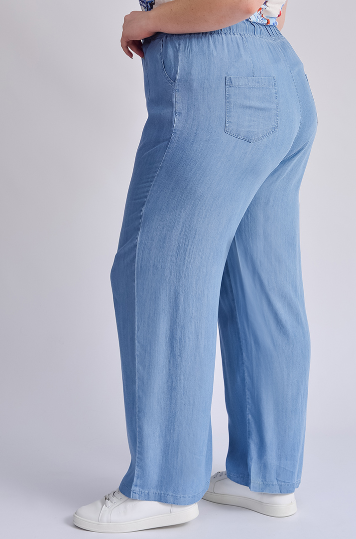 Легкі блакитні джинси з тенселу великих розмірів