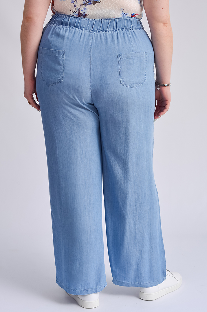 Легкі блакитні джинси з тенселу великих розмірів