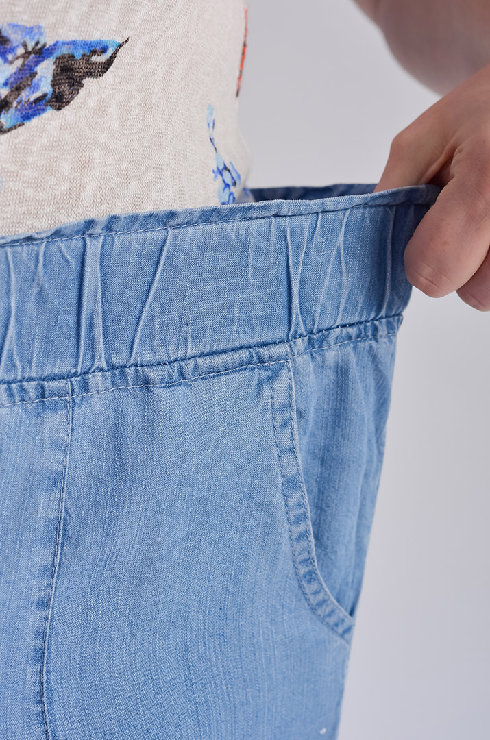 Легкі блакитні джинси з тенселу великих розмірів