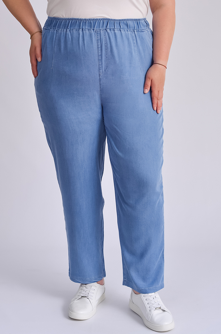 Джинси 7/8 блакитного кольору великих розмірів