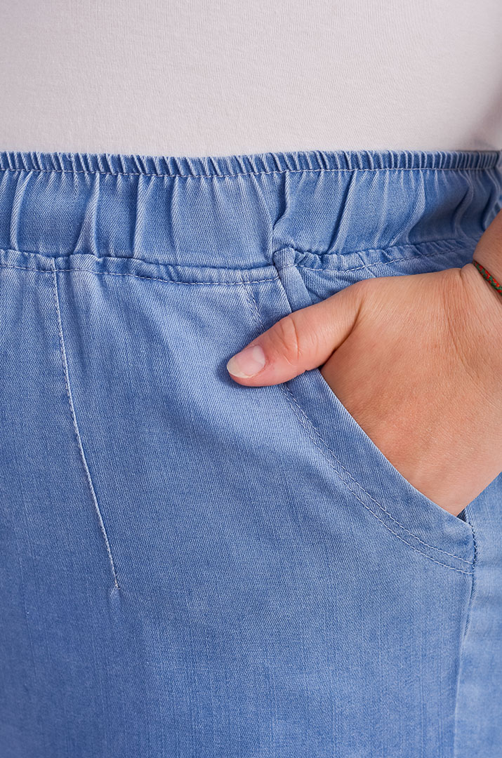 Джинси 7/8 блакитного кольору великих розмірів