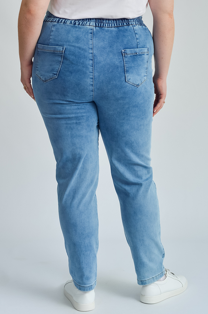 Джинси завужені з мінімалістичною вишивкою великих розмірів