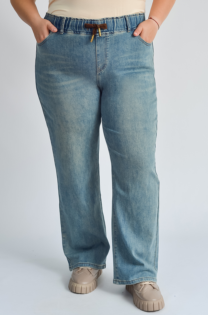 Джинси з кишенями та еластичним поясом великих розмірів