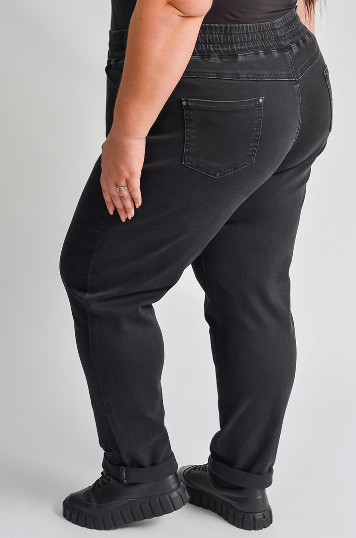 Джинси 7/8 з резинкою та стильними прорізами великих розмірів