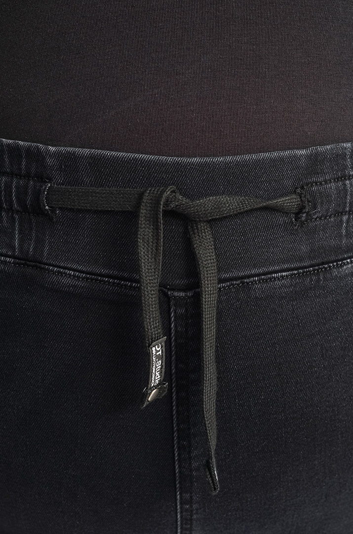 Джинси 7/8 з резинкою та стильними прорізами великих розмірів