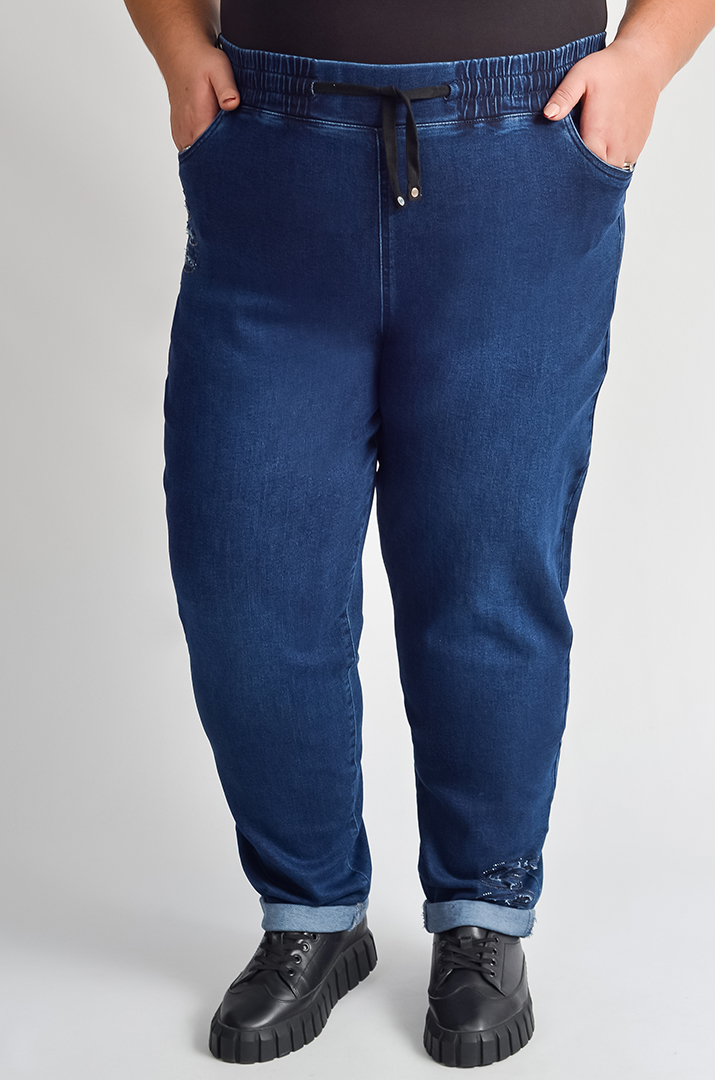 Джинси 7/8 з резинкою та стильними прорізами великих розмірів