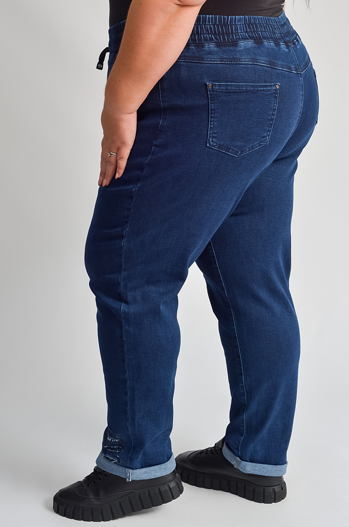 Джинси 7/8 з резинкою та стильними прорізами великих розмірів