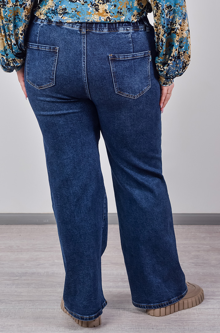 Джинси темно-синього кольору з широкими штанинами великих розмірів