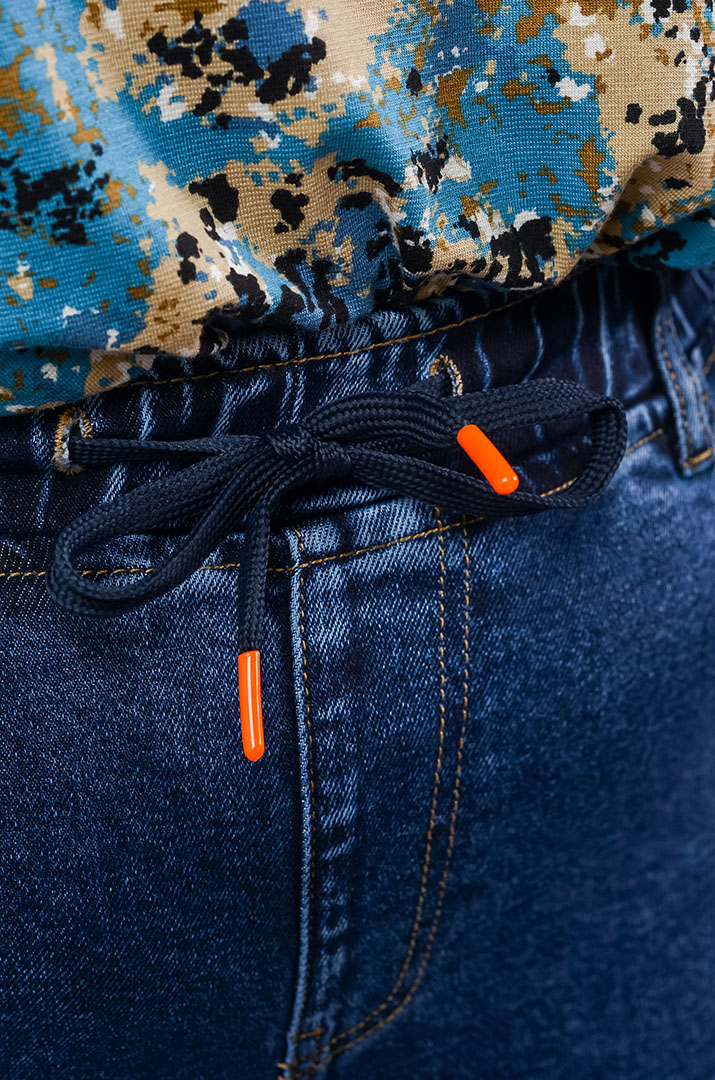 Джинси темно-синього кольору з широкими штанинами великих розмірів