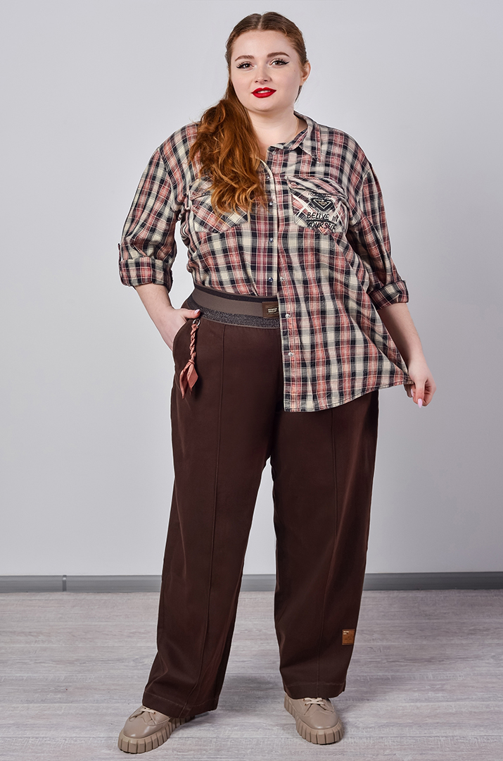 Джинси широкі в коричневому кольорі з декоративною прикрасою великих розмірів